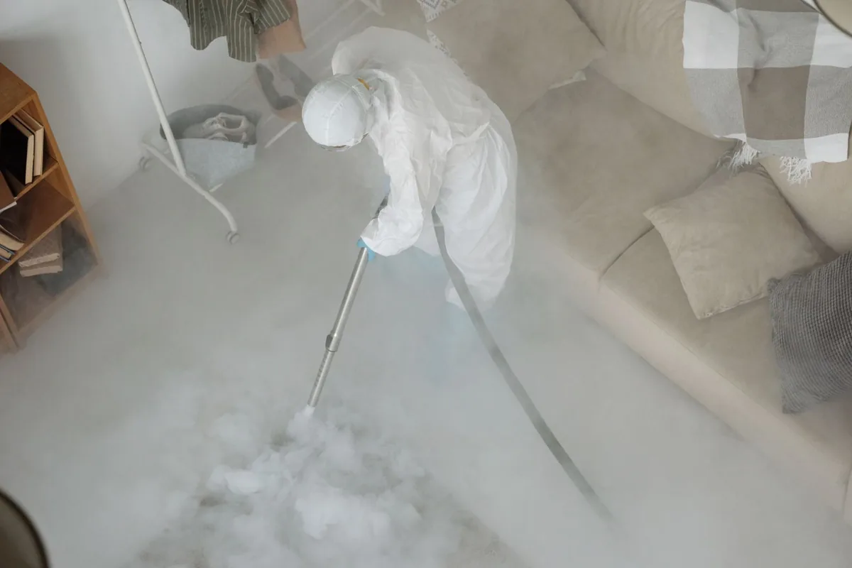 Biohazard cleanup technician in protective equipment, Bensley, VA